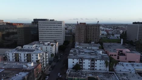 Dynamic-drone-pan-of-urban-city-in-Los-Angeles-during-golden-hour