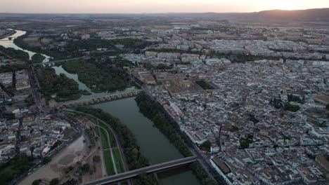 panoramic-aerial-view-of-the-mosque-cathedral-in-Cordoba,-Spain-during-dusk