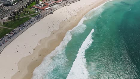 Aerial-drone-shot-of-Bondi-Beach,-one-of-Australia's-most-iconic-coastal-destinations