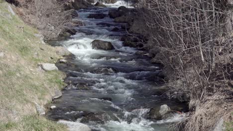 Part-of-River-Etsch-that-flows-through-Burgeis---Burgusio,-South-Tyrol,-Italy