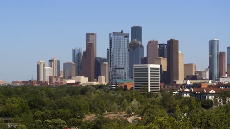Establishing-shot-of-clear-blue-sky-and-downtown-Houston,-Texas