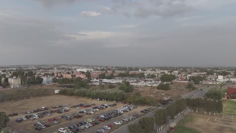 Overflight-in-cuautitlan-mexico,-houses,-apartments,-buildings,-parking-lots-and-cilo-in-destruction,-train-station,-suburban-cuautitlan