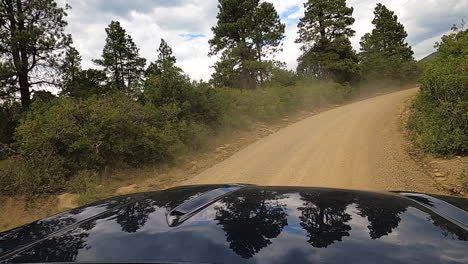 Meeting-another-off-road-vehicle-on-gravel-pathway,-driving-POV-shot