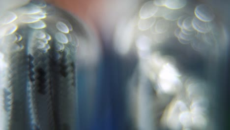 Macro-close-up-shot,-USB-wire-in-a-round-plastic-cover,-DREAMY-BOKEH,-charging-cable-in-a-glowing-clear-case