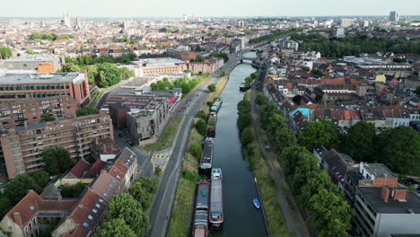 Upward-Reveal-of-the-city-of-Ghent-with-Canal-and-Historical-Center