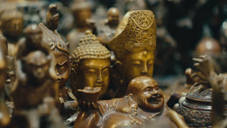 Buddha-Statue-Figures-In-Antique-Shop---Close-Up