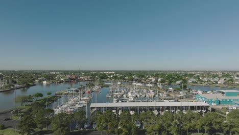 An-aerial-view-of-the-Seabrook-Marina-under-clear-blue-skies-in-Seabrook,-Texas