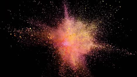 A-burst-of-matter-erupts,-a-vivid-blend-of-pink-and-yellow-against-a-black-backdrop,-objects-disintegrating-into-dust-particles