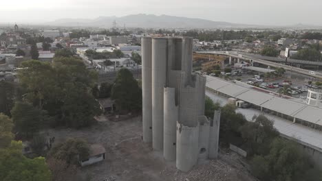 Overflight-in-cuautitlan-mexico,-in-front-of-destroyed-silos