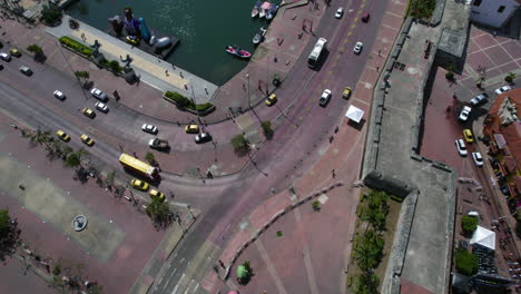 Cargategena,-Colombia,-Revealing-Drone-Shot-of-Coastal-Traffic,-Harbor-and-Bocagrande-Hotels