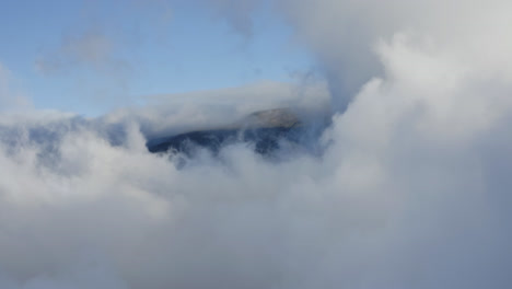 White-clouds-covering-and-hiding-Haleakala-volcano-on-Maui-Hawaii-on-a-cloudy-day