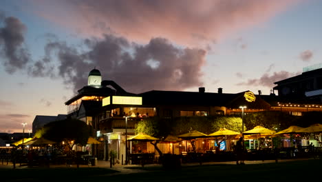 Warm-inviting-lights-of-Hermanus-restaurants-at-waterfront-with-twilight-sky