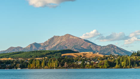 Wanaka-town,-mountain,-and-lake-in-South-Island-New-Zealand---daytime-time-lapse