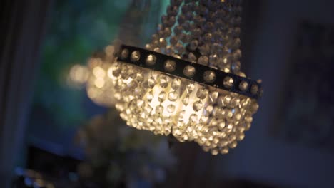 closeup-of-crystal-chandelier-hanging-on-the-ceiling