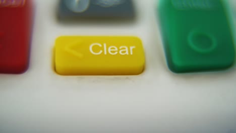 A-macro-close-up-shot-of-a-pin-pad-numbers-and-letters-on-colorful-buttons,-smooth-PULL-UP-movement,-Full-HD-video,-super-slow-motion,-blurry-depth-of-field