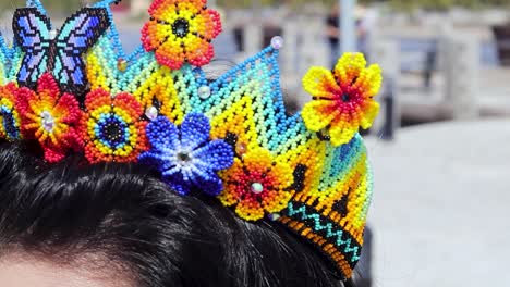 Woman-head-with-crown-of-colorful-bead-patterns