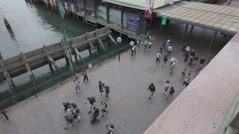 People-walking-at-the-Circular-Quay-Ferry-Wharf,-Sydney,-NSW-Australia