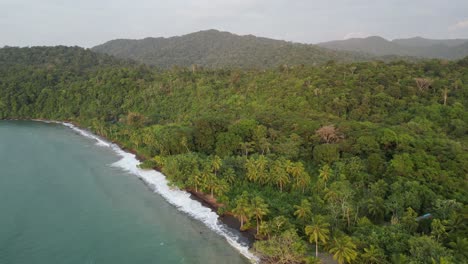 Aerial-view-of-Playa-Mecana-and-the-lush-jungle-in-the-Chocó-department-near-Bahía-Solano-on-the-Pacific-Coast-of-Colombia