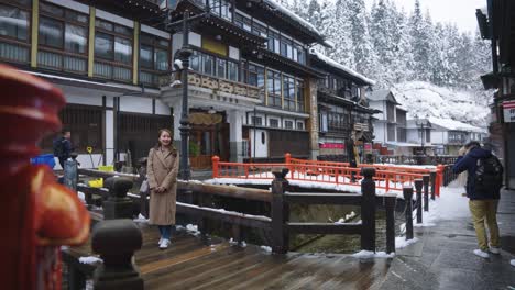 Slow-Focus-Reveal-of-Ginzan-Onsen,-Traditional-Ryokan-Town-in-Winter