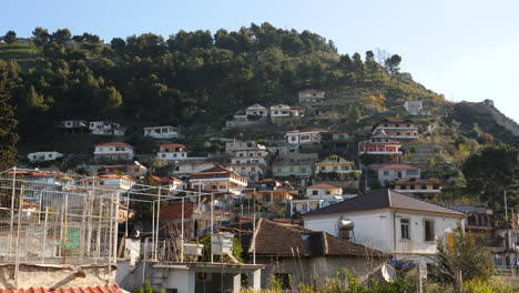 UNESCO-Town-Berat,-White-Villas-in-Mountains,-Albania,-Tilt-Up