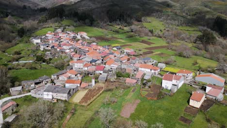 Rebordechao,-Vilar-de-Barrio,-nestled-in-green,-ourense,-galicia,-spain---aerial