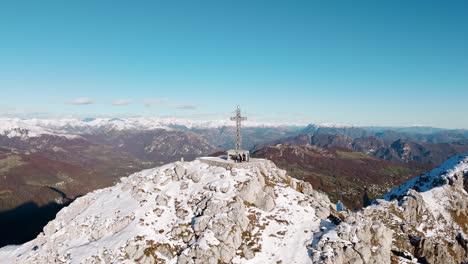 Aerial-View-Of-Telecommunications-Tower-On-Snow-Covered-Peak-At-Monte-Resegone