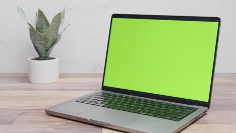 Green-screen-laptop-work-from-home-setup-with-white-marble-background