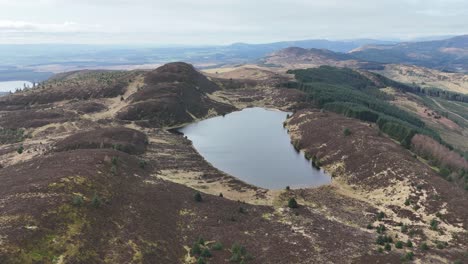 View-of-a-pond-on-top-of-Ben-Gullipen-hill-in-scotland