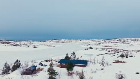 Aerial-View-Of-A-Cabin-Amidst-Winter-Landscape-In-Verran,-Indre-Fosen,-Norway