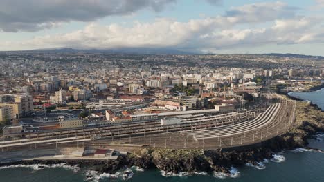 Large-rail-track-network-in-the-city-of-Catania-while-a-bird-flies-by-the-aerial-view