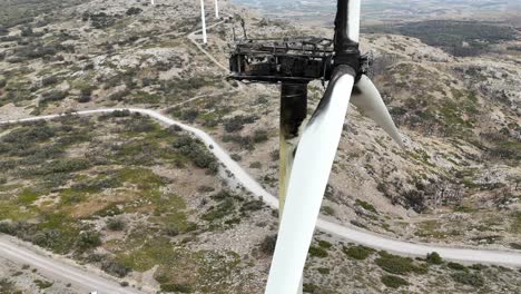 Closeup-view-of-a-wind-turbine-destroyed-by-a-fire-in-a-arid-mountanous-area-in-SE-Spain