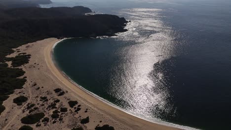 Drone-eye-view-of-unspoiled-beach-in-Huatulco,-Oaxaca,-Mexico