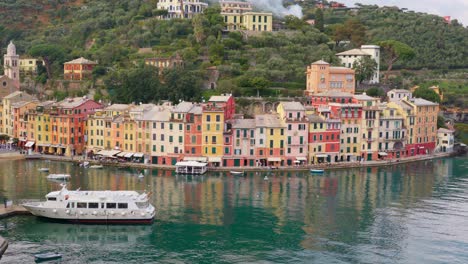 Luxurious-cruise-yacht-mooring-in-harbor-of-picturesque-Portofino-town