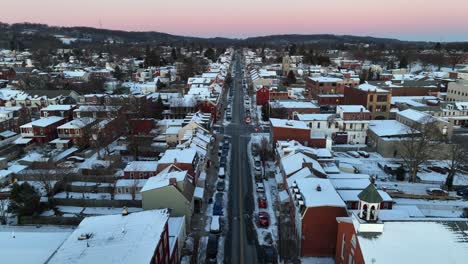 Main-Street-of-american-Town-during-winter-snow-and-sunrise-in-the-Morning