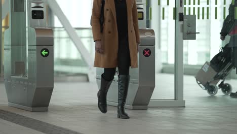 slow-motion-of-passenger-entering-the-automatic-ticket-door-inside-the-Réseau-express-métropolitain-REM-automated-light-rail-system