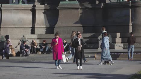 Fixed-Shot-Of-Ladies-Waiting-On-Street-In-Maria-Theresien-Plaza,-Vienna,-Austria