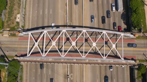 Birds-eye-view-of-car-traffic-on-59-South-freeway-in-Houston,-Texas