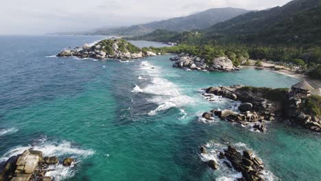 Aerial-establishing-shot-of-the-tropical-rocky-coastline-at-Cabo-San-Juan