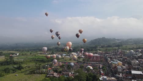 Aerial-view,-hot-air-balloon-festival-in-Kembaran-village,-Wonosobo