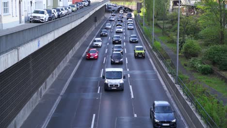 Static-Camera-Shot-of-a-big-Street-with-incoming-traffic-in-Berlin,-next-to-Messe-Nord-ICC