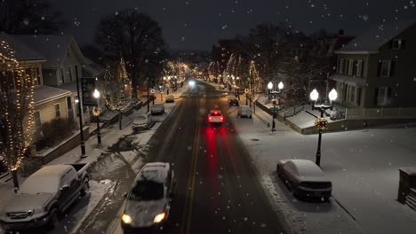 Snow-flurries-falling-on-small-town-in-USA-during-night
