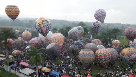 Aerial-view,-hot-air-balloon-festival-in-Kembaran-village,-Wonosobo