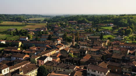 Establishing-drone-shot-of-the-Refrancore-town,-golden-hour-in-Monferrato,-Italy