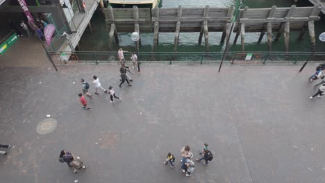 Aerial-elevated-view-of-people-or-tourists-walking-at-Circular-Quay-Sydney-Harbour-wharf