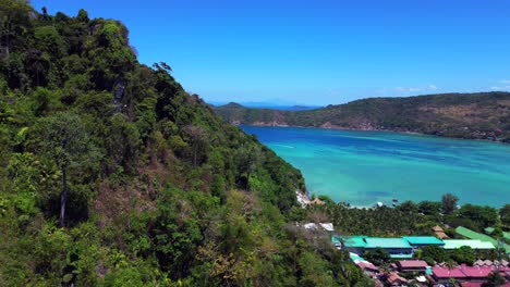 Turquoise-blue-sea-Cliffs-Rocks-island-hill-beach