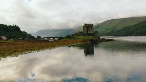 Scottish-Highlands-Aerial-of-Eilean-Donan-a-Famous-Castle-on-Loch-Duich-in-Scotland,-United-Kingdom,-Europe