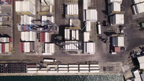 Santa-Marta's-bustling-port,-a-hub-of-Colombian-trade---aerial-top-view