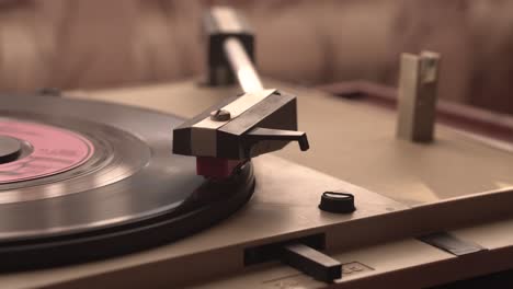 Starting-Playing-Vinyl-Record-on-Vintage-Gramophone,-Placing-Needle,-Close-Up