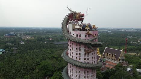aerial-drone-view-of-buddhist-Dragon-Temple,-Wat-Sam-Phran-near-Bangkok-Thailand