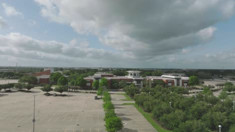 An-aerial-establishing-shot-of-the-San-Jacinto-College-Central-Campus-on-Spencer-Hwy-in-Pasadena,-Texas